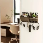Key Holder in Wood in Brown in use at home